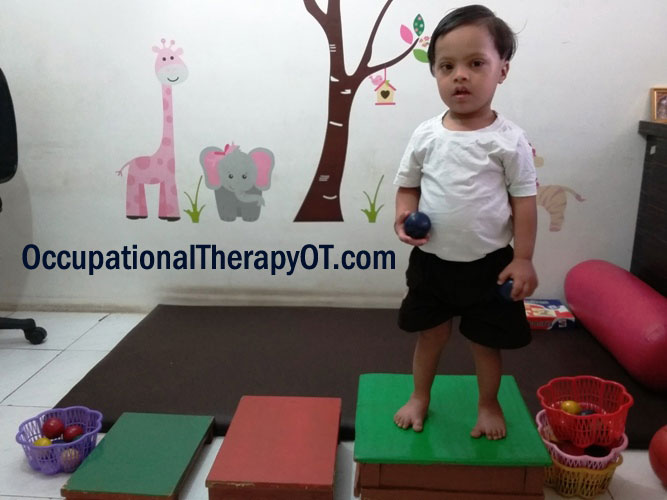 Occupational therapy activity for a child with Down syndrome